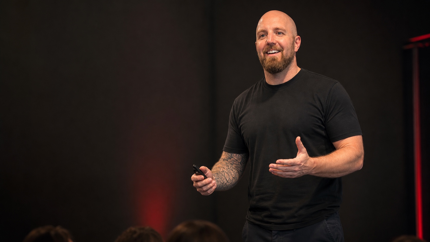 Kieren Newborn presenting on stage
